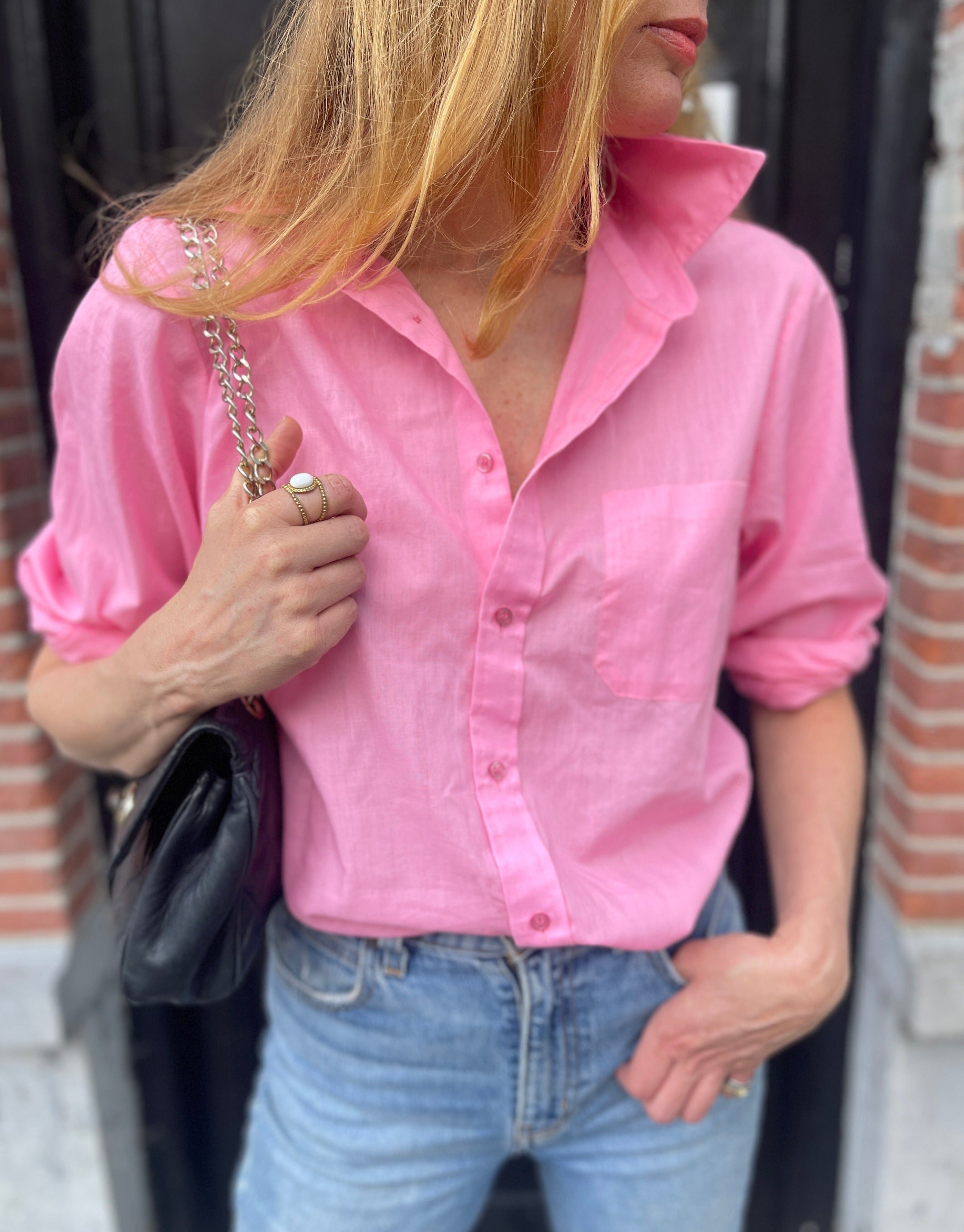 Pink shirt.