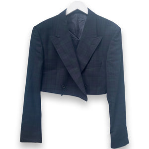 Cropped navy Burberry skirt suit.