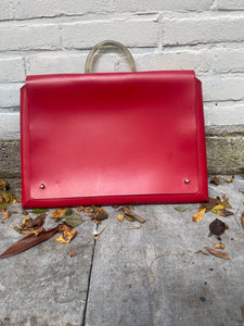 Red laptop bag.
