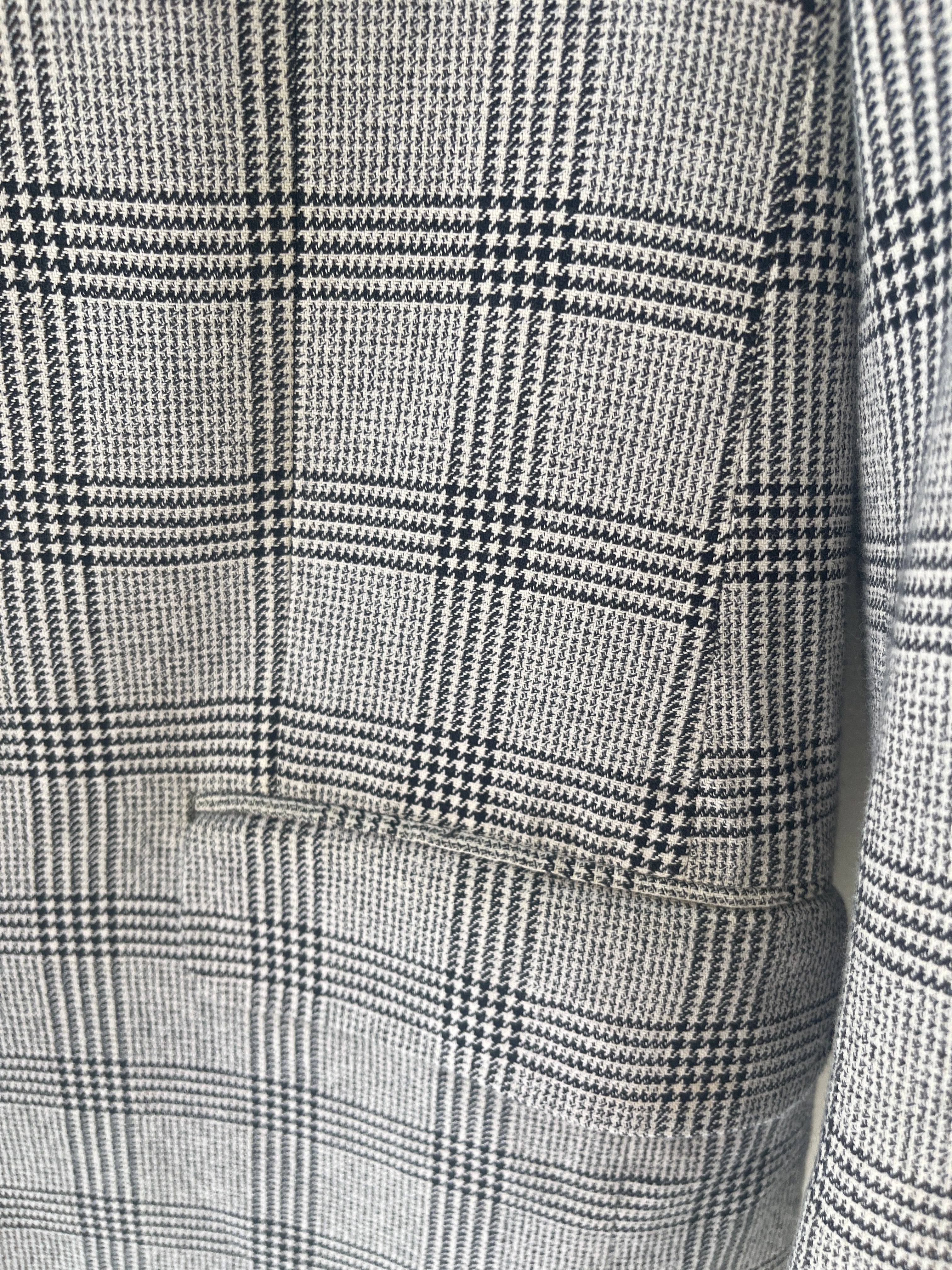 Checked light grey blazer by Yves Saint Laurent.