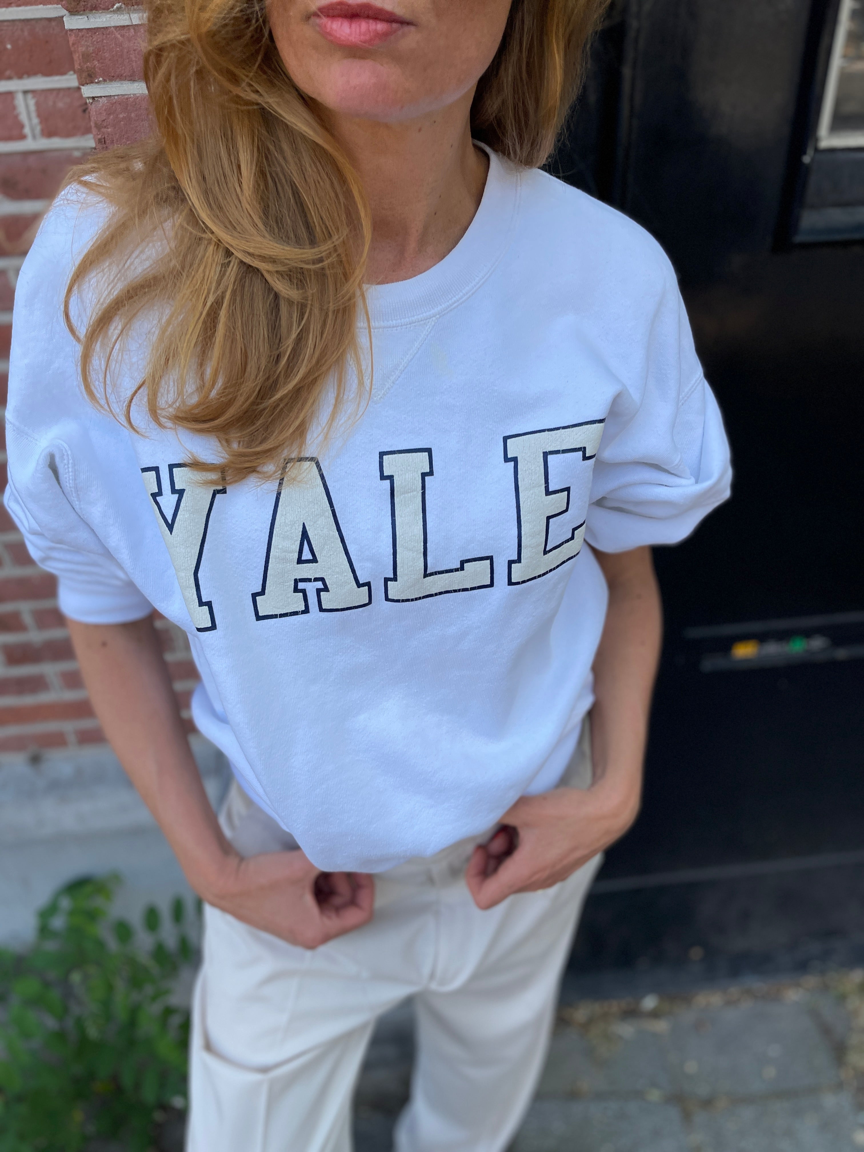 white Yale college sweatshirt