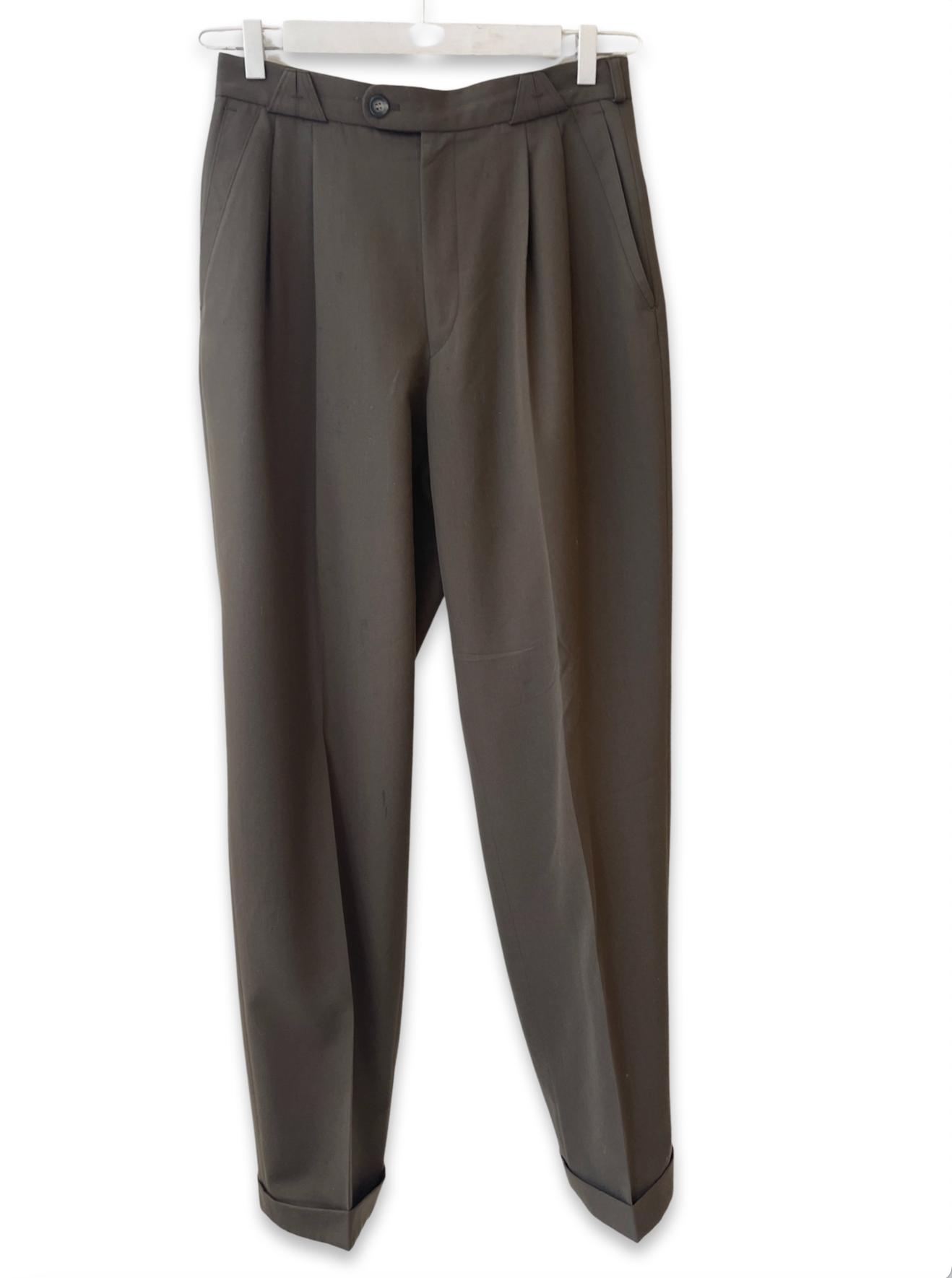 Dark olive pleated pants.