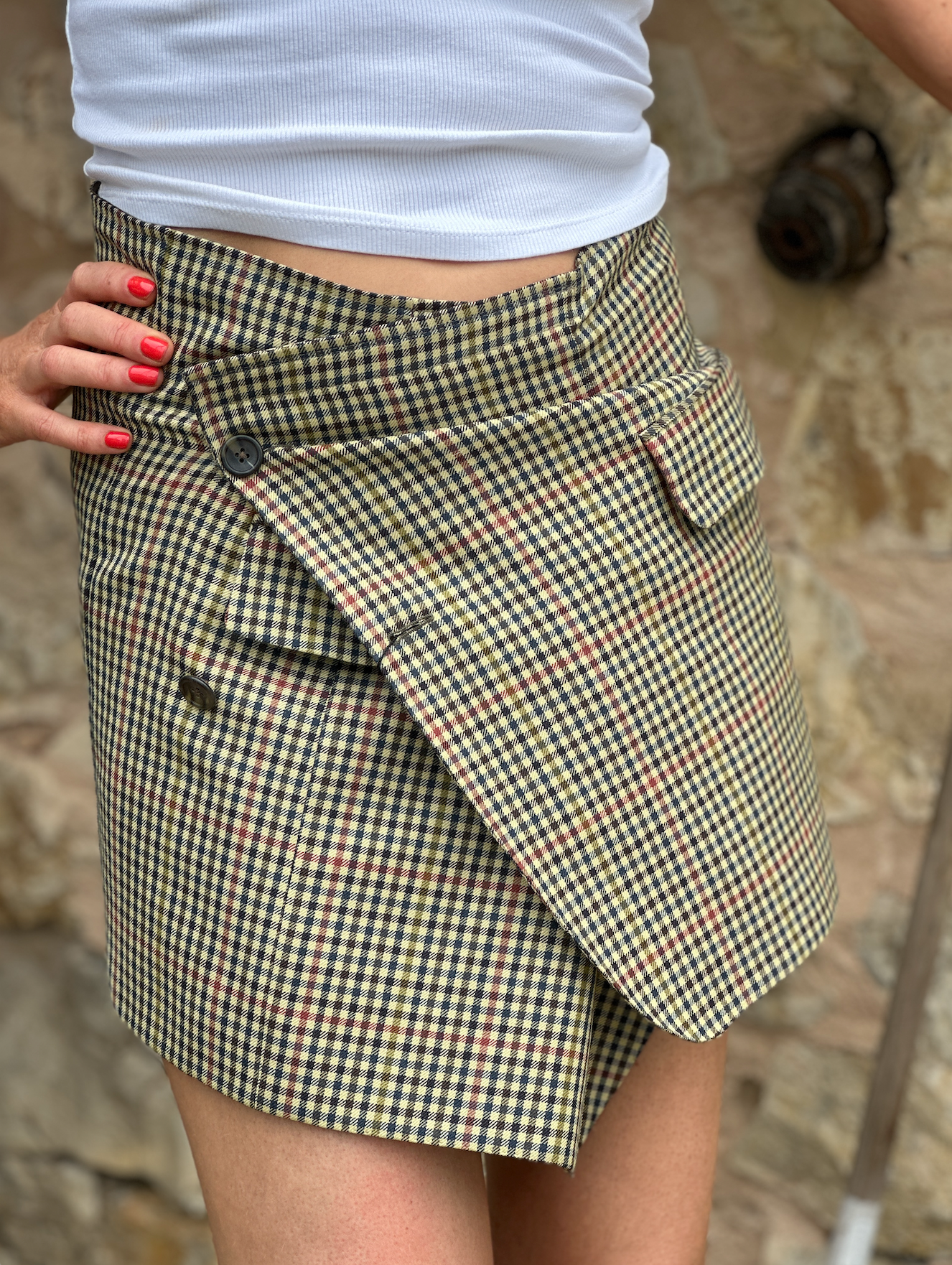 Cropped Burberry skirt suit.