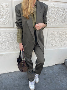 Khaki double breasted suit.