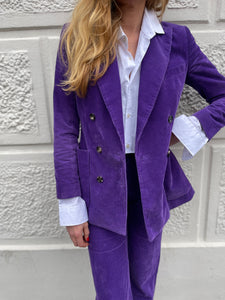 Purple corduroy suit by Bella Freud.