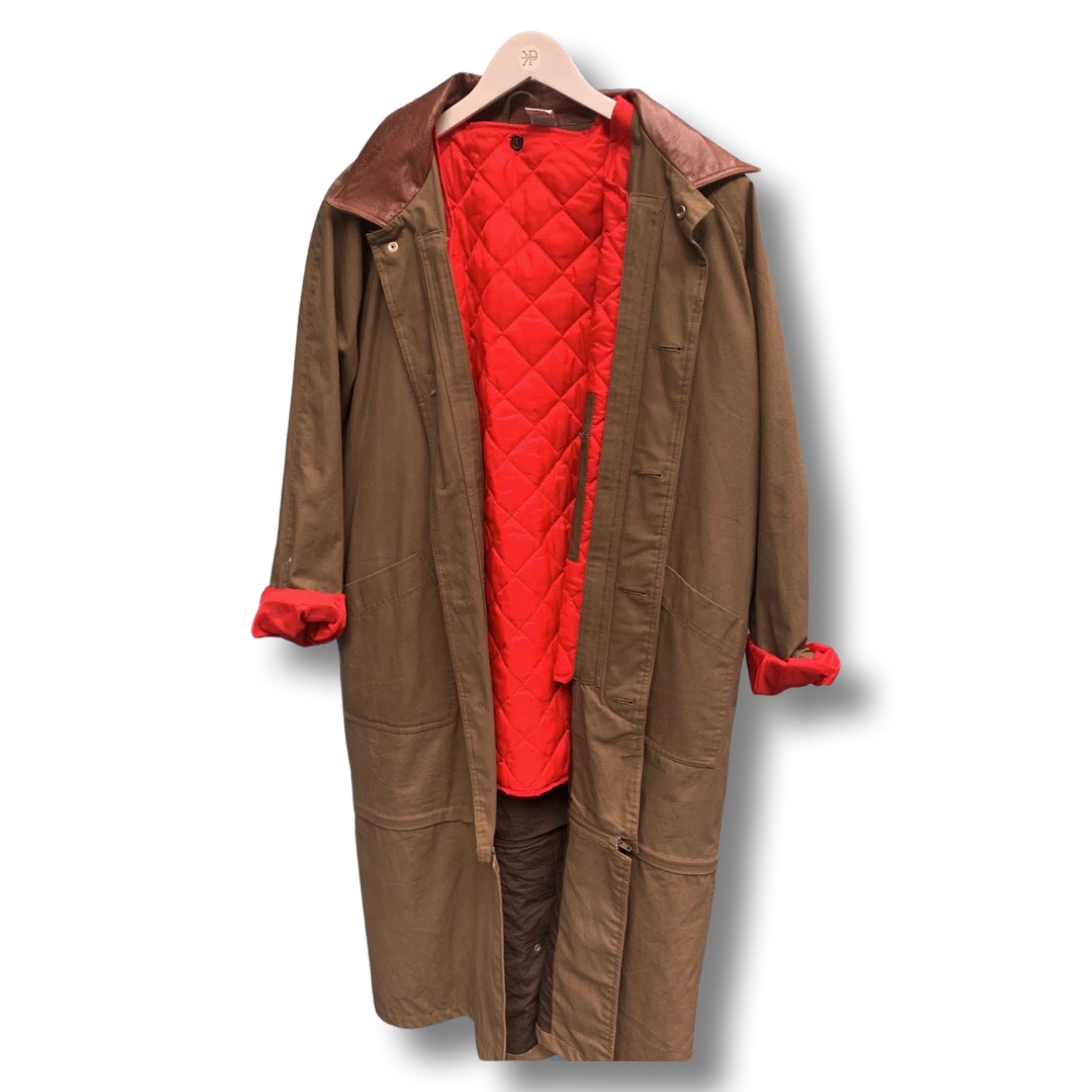 Long khaki brown vintage coat with quilted inner red jacket.