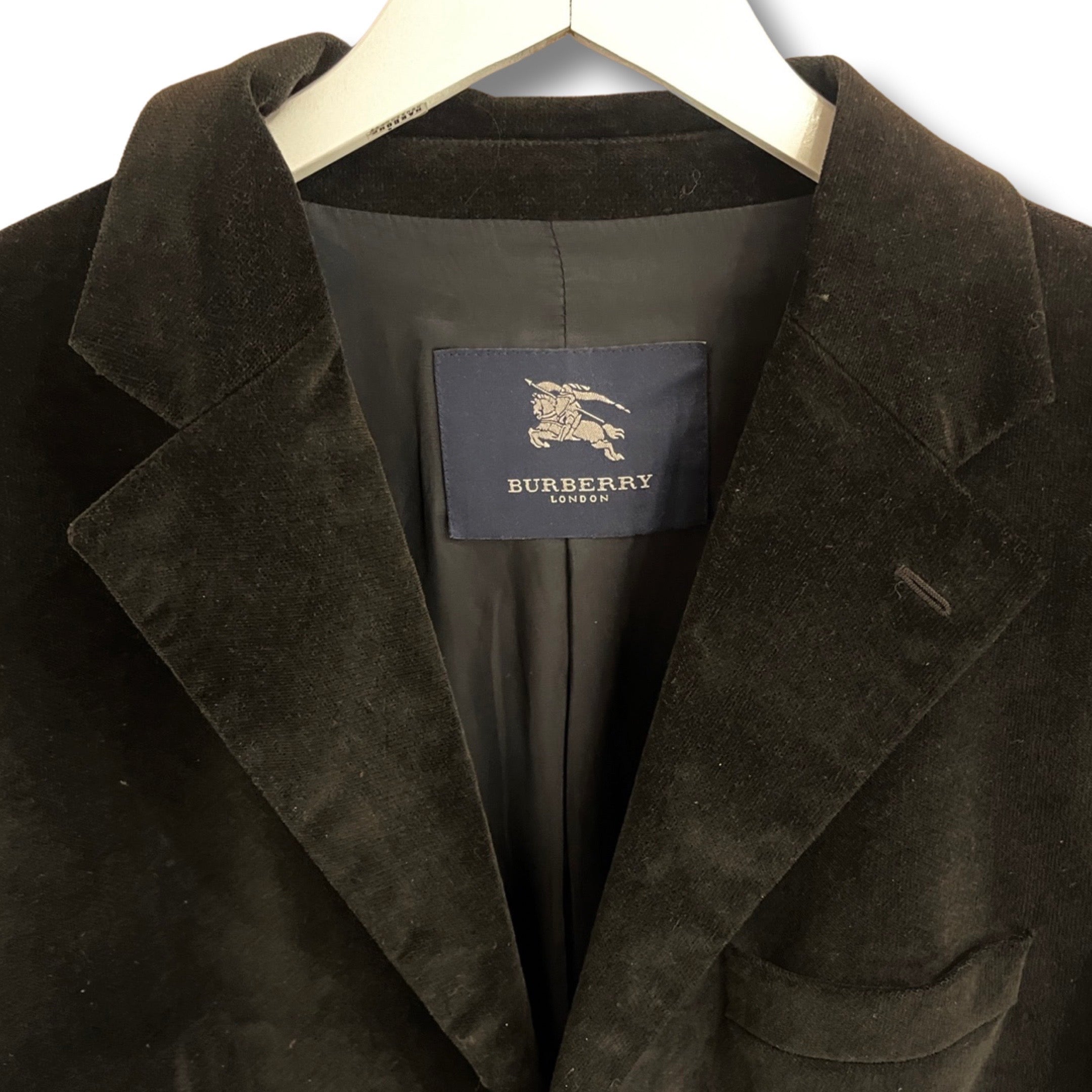 Velour black blazer by Burberry.