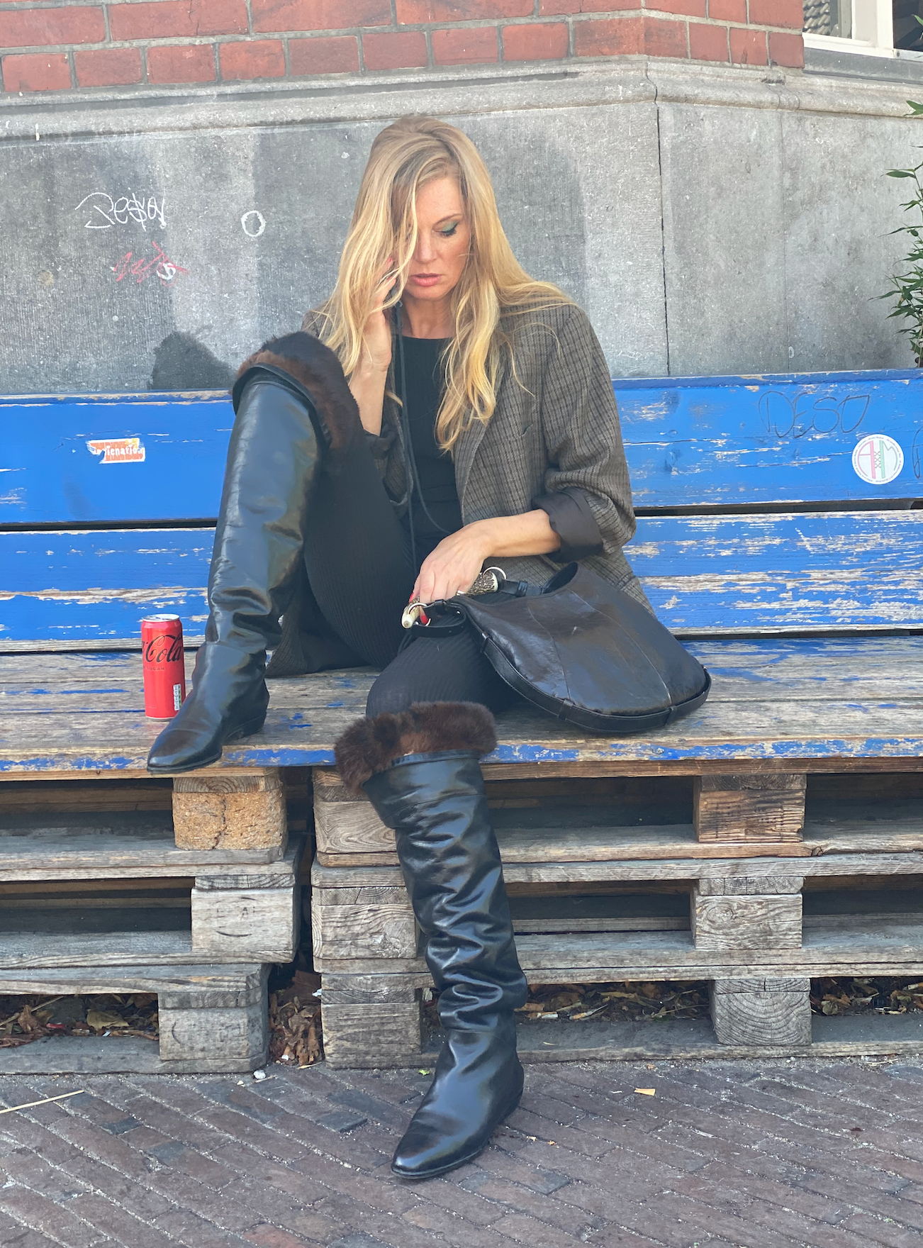 Black over the knee boot with soft fur lining. kath a porter