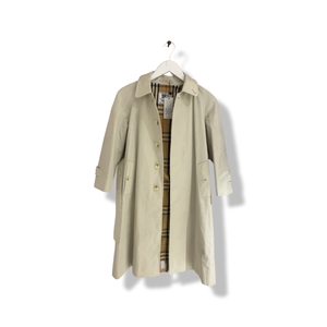Kids size trench coat by Burberry.